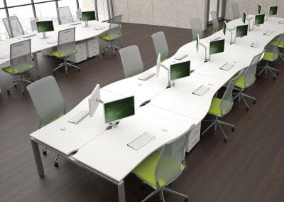 Wave from back to back bench desks with 3 drawer under desk pedestal units, desk mounted monitor stands and mesh back operator chairs