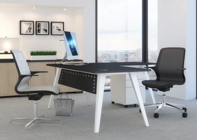 Designer executive desk with black top, white legs, modesty panel, 3 drawer wheeled pedestal unit and mesh back chairs