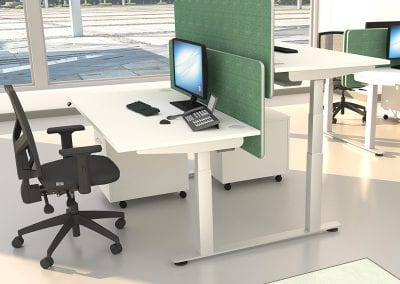 White sit or stand height adjustable desks with cable ports and desktop divider screens, matching pedestal drawer units and fully adjustable operators chairs