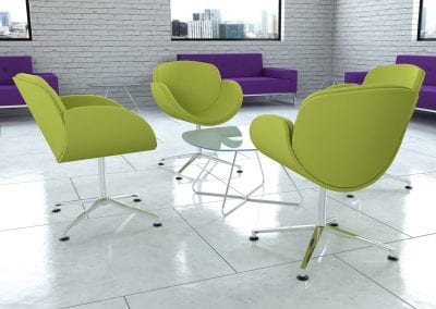 Designer lime green occasional chairs with chrome legs, glass top coffee table with chrome legs and purple block sofas