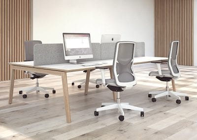 Bespoke white top and wooden leg back to back desks with integrated divider screens and white framed mesh back operator chairs