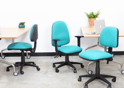Adjustable operator task chairs with swivel bases, different back rest and arm options, and two flip top meeting tables