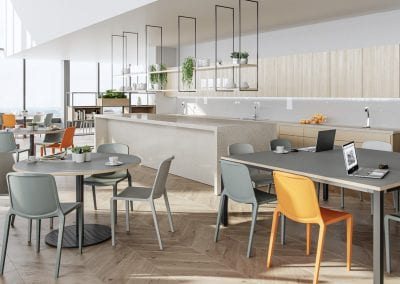 Kitchen preparation and serving counter, circular and rectangular grey top dining tables with grey plastic stacking chairs