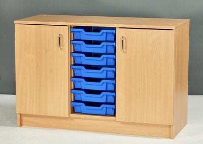 Educational storage cabinet in wood veneer with double doors and centre section for tray storage