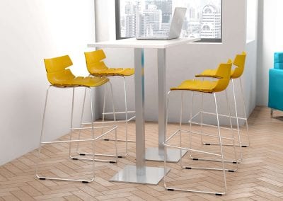 High white topped rectangular breakout table with metal legs and designer yellow and chrome legged stools