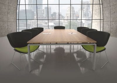 Large designer wood veneer meeting table with metal legs and designer charcoal grey and lime green meeting chairs