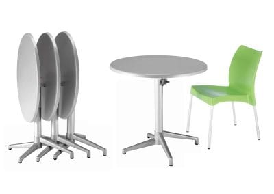 Round tilt top tables on metal legs with green plastic formed stackable chair