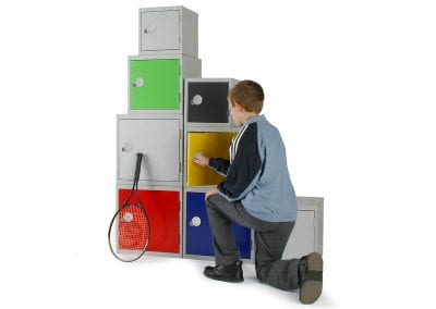A selection of different sized, different coloured stackable personal effects lockers