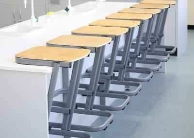 Laboratory cantilever stools with wooden seats and metal frames