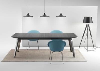 Designer black and chrome highlight boardroom table with cable managment and teal boardroom chairs