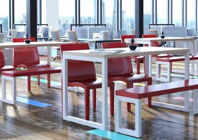 Dining refectory bench tables with wood effect tops and white frames, with matching bench seating and red stackable chairs