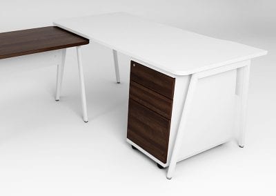 Ascend white pedestal with dark wood veneer drawer fronts, positioned underneath an Ascend white desk and dark wood veneer Ascend side table