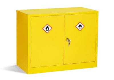 Half height bright yellow hazardous materials storage cabinet with double doors, locking handle and internal shelves