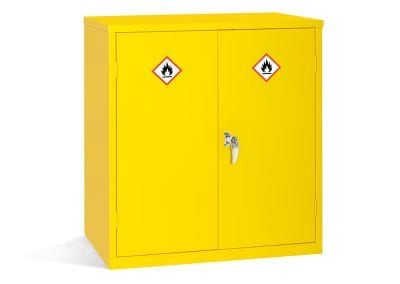 Bright yellow hazardous materials storage cabinet with double doors, locking handle and internal shelves
