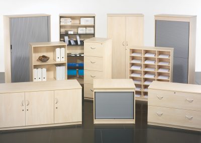 Wooden office storage units in an array of options including tambour door units, shelving and cupboards in various sizes