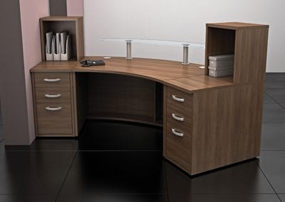 Receptiv 19 curved reception pedestal desk in dark wood veneer, with desktop mounted storage boxes and raised glass customer transaction counter