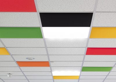 Easy install suspended acoustic ceiling panels for use in traditional suspended ceiling systems