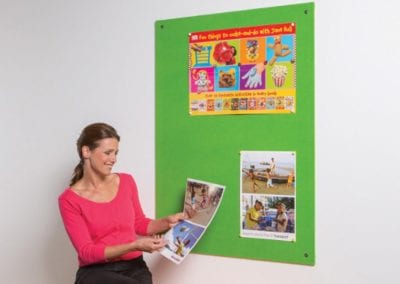 Wall mounted fabric covered frameless noticeboard