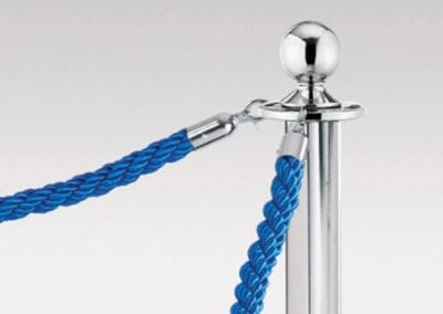 Chrome ball topped barrier pole with blue braided ropes and chrome fixings