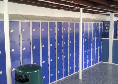 Colour coded key locking metal lockers with sloping security top for education, workplaces and sports clubs